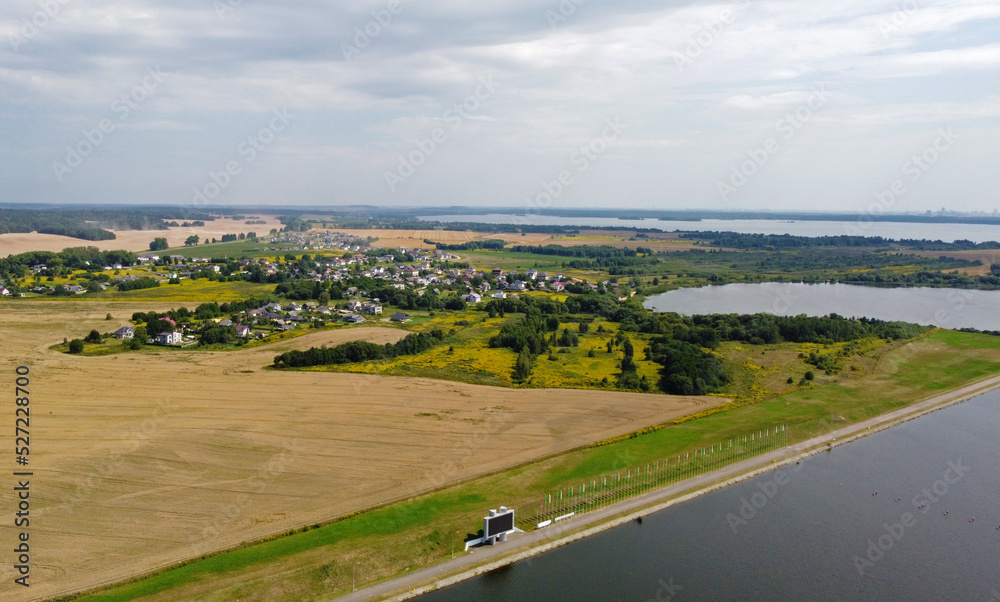 Aerial view of agro rural fields. Harvesting on the farm landscape