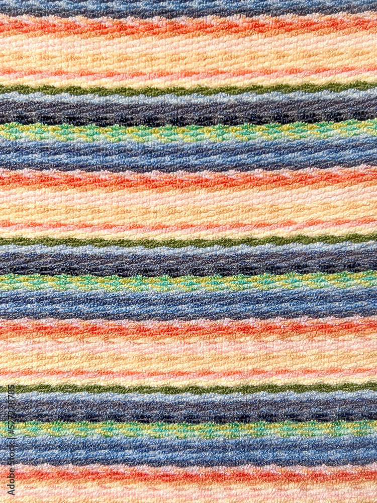 Towel texture background. Cotton. Fabric. Textile. Colourful towel. Wallpaper. Surface. Horizontal stripe pattern.