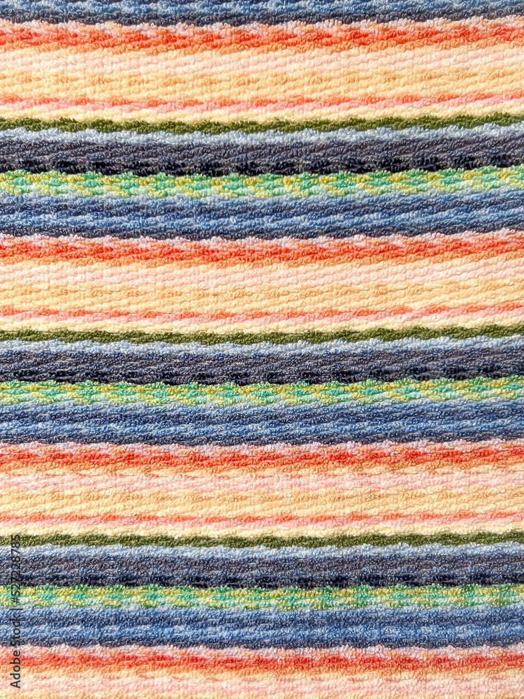 Towel texture background. Cotton. Fabric. Textile. Colourful towel. Wallpaper. Surface. Horizontal stripe pattern. Towel texture background. Cotton. Fabric. Textile. Colourful towel. Wallpaper. Surface. Horizontal stripe pattern.