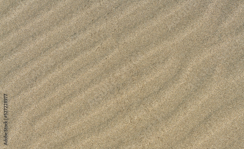 Textured lines in the sand. Abstract background.