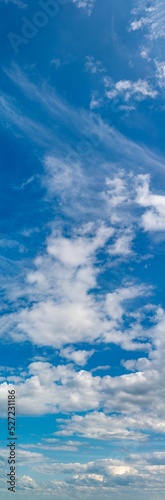 Fantastic clouds against blue sky, panorama © StepStock