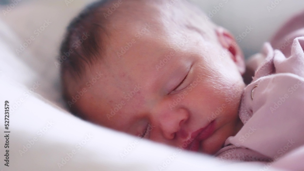 newborn baby sleeping. cute a brunette newborn baby sleeping in bed close up in maternity hospital bedroom. happy family lifestyle kid dream concept. cute newborn baby girl sleeping close up newborn baby sleeping. cute a brunette newborn baby sleeping in bed close up in maternity hospital bedroom. happy family lifestyle kid dream concept. cute newborn baby girl sleeping close up