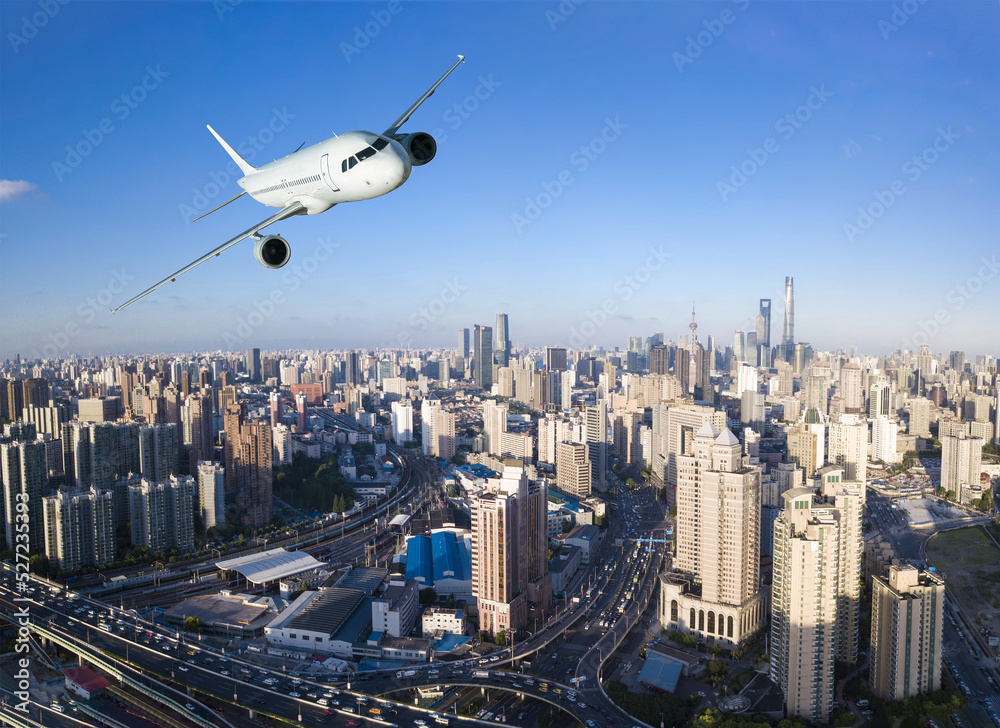 Plane flying over the shanghai city