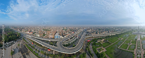 A 180-degree aerial panorama of Aazadi Chowk interchange, located in the historic are of the city and in the vicinity of the historic and famous Badshahi Mosque and Pakistan Monument.  photo