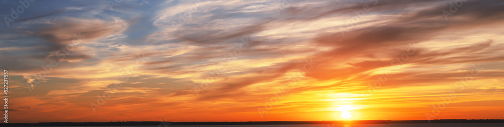 sky sunset. Real amazing panoramic sunrise or sunset sky with gentle colorful clouds. wide panorama. Colorful of sunset sky