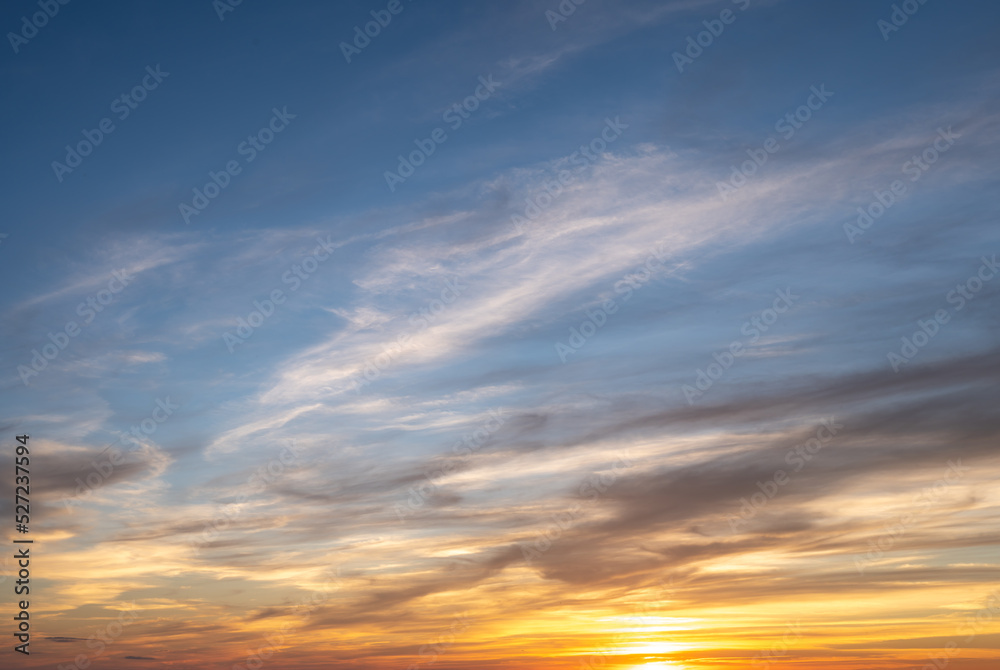 Colorful cloudy sky at sunset. Gradient color. Sky texture, abstract nature background. Beautiful colorful dramatic sky with clouds at sunset or sunrise.
