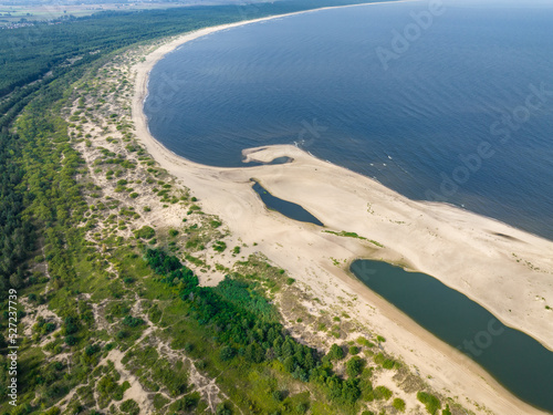 Fototapeta Naklejka Na Ścianę i Meble -  Baltic Sea and Vistula Estuary Aerial View. The Bay of Gdańsk at summer time. from above. Baltic Sea, Mikoszewo. Poland. Europe. 