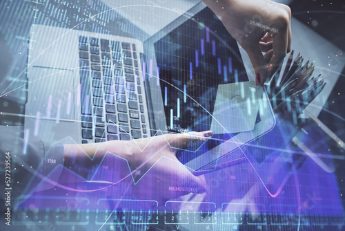 Wallpaper Mural Double exposure of businesswoman hands typing on computer and financial graph hologram drawing. Stock market analysis concept. Torontodigital.ca