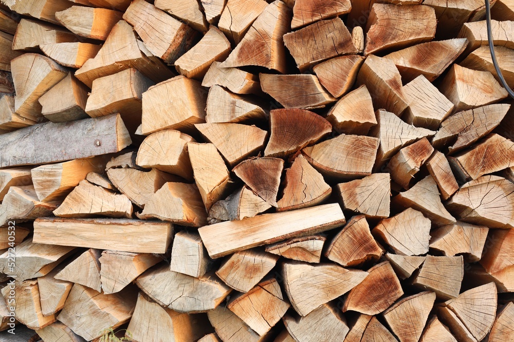 Stack of chopped firewood as background, closeup Stack of chopped firewood as background, closeup