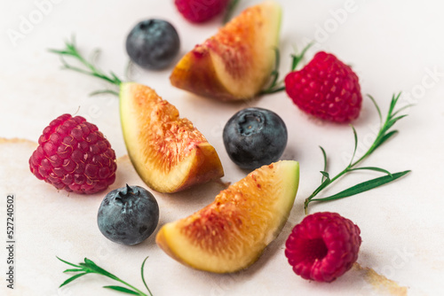 Fototapeta Naklejka Na Ścianę i Meble -  Ice cream cones with berries. Fresh berry fruit, top view of figs, blueberry, raspberry