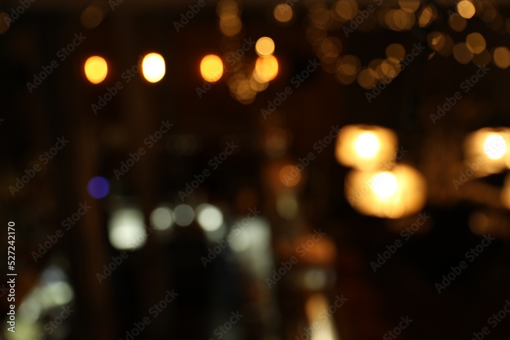 Blurred view of stylish modern bar interior with bokeh effect Blurred view of stylish modern bar interior with bokeh effect