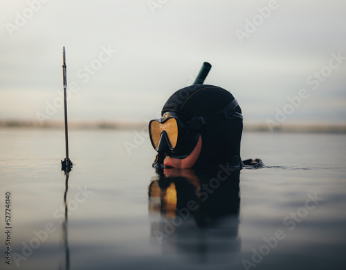 Spear fisherman fishing with a speargun in the sea Fototapet