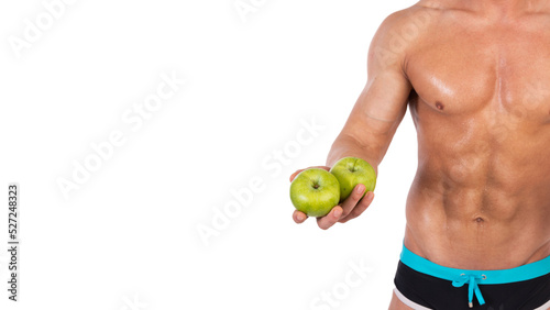 Diet and healthy lifestyle. Young attractive guy with a nice body and sports supplements. © vladorlov
