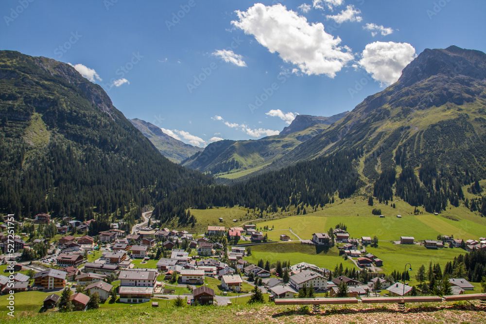 View of austrian village Lech am Arlberg at the European Alps with mountain Omeshorn, during summer