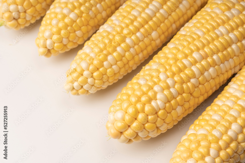 Yellow corn isolated on white background. Copyspace. Yellow corn isolated on white background. Copyspace.