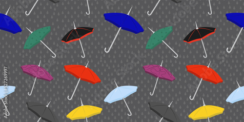 Seamless pattern with colored umbrellas on a gray background. Background with raindrops, protection from rain, autumn, melancholy. Elegant print on clothes, raincoats, covers. Vector stock image.