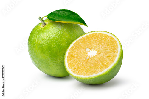 Bitter orange (Aurantium citrus or Seville orange) with cut in half sliced and green leaf isolated on white background. photo
