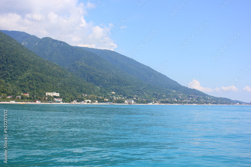 view of the city of gagra and the mountain from the black sea