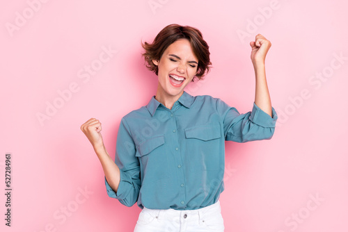 Obraz na płótnie Photo portrait of pretty young girl raise fists screaming yeah job promotion dre