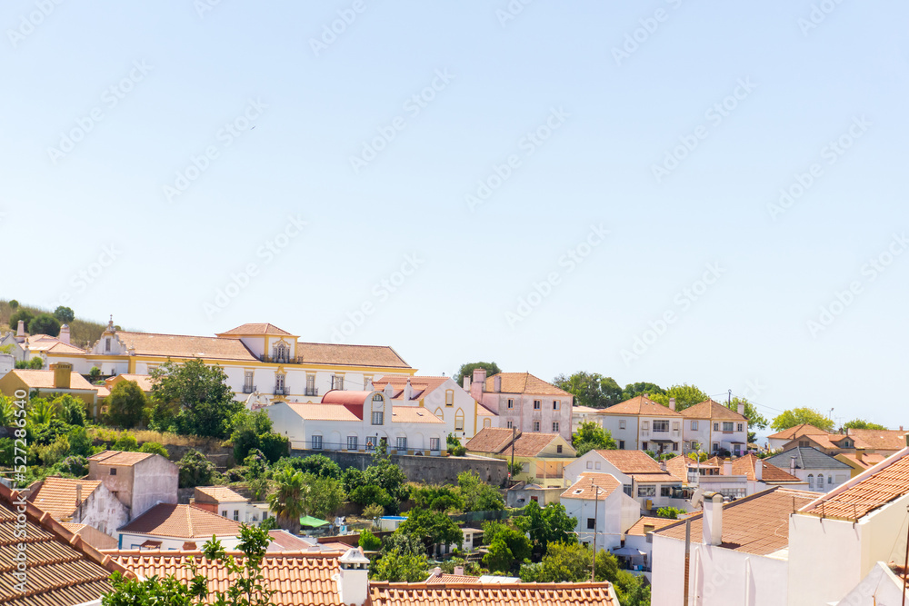 View of white houses with red tiled roofs in a Portuguese town