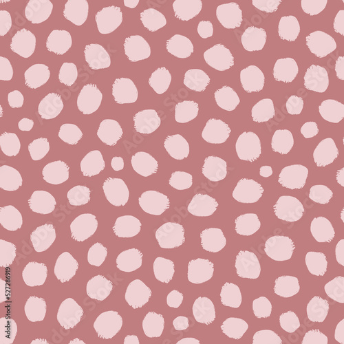 Vector Brownish pink hand drawn spotty dotty seamless pattern design. Perfect to use on surface such as fabric, textiles, stationary, gift wrapping paper and many more. Versatile design can be used