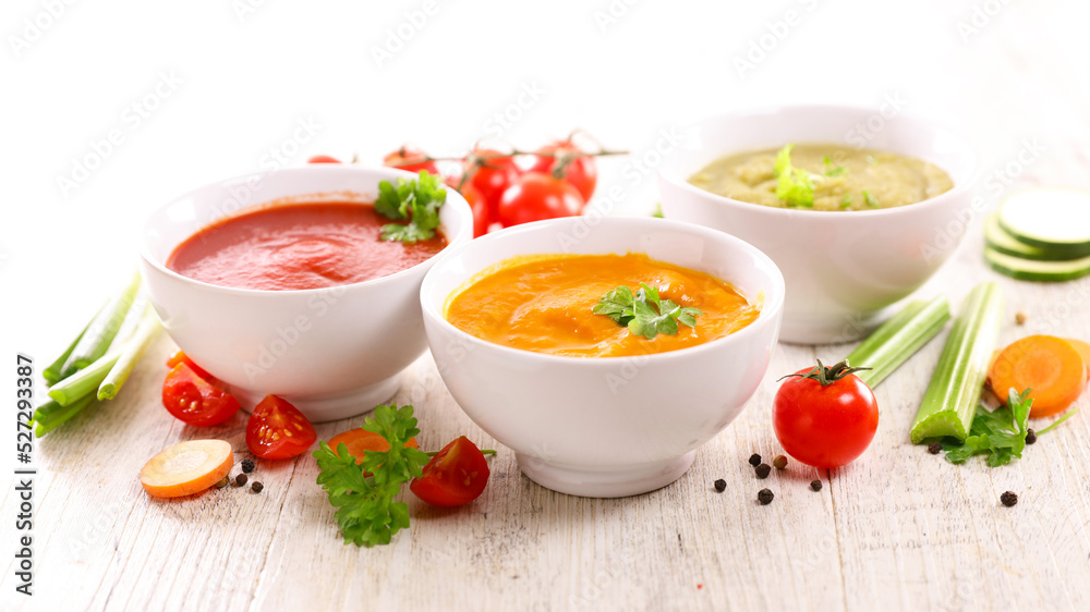 assorted of bowl of soup ( zucchini, tomato and pumpkin or carrot) assorted of bowl of soup ( zucchini, tomato and pumpkin or carrot)