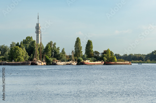 Recreational lake Mooie Nel in Spaarnwoude with a view on telecommunication tower