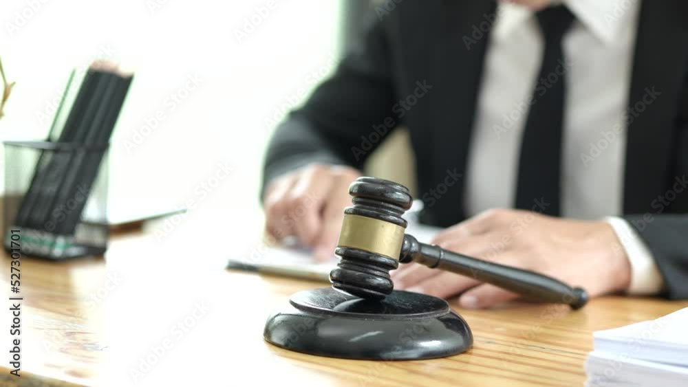 Consult Judge or lawyer Hand Writing Document in Court Room.