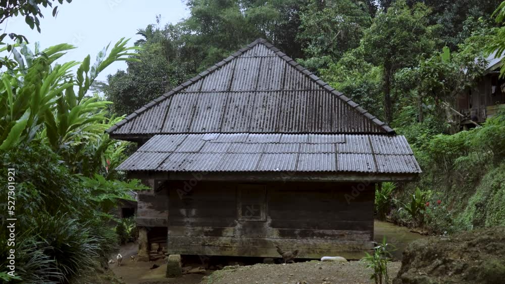 An Old House Standing in the Middle of Village Surrounded by Nature An Old House Standing in the Middle of Village Surrounded by Nature