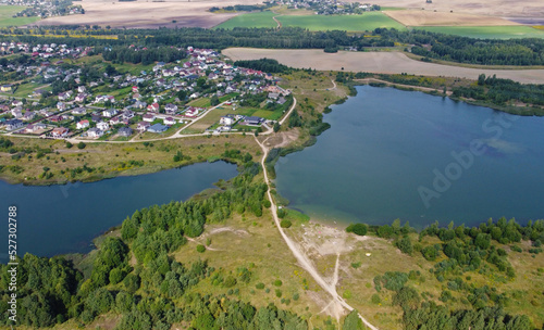 Aerial view of a beautiful suburban lake in an expensive elite neighborhood