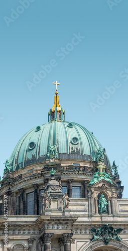 Cover page with famous central Unter den Linden street, Berlin Cathedral in historical and business downtown of Berlin, Germany, at summer sunny day and blue sky background with copy space.
