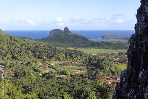 Atalaia Hill near Sueste beach, with turquoise clear water, at Fernando de Noronha Marine National Park, a Unesco World Heritage site, Pernambuco, Brazil. photo