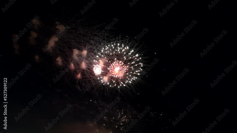 Awesome Real Firework on Deep Black Background Sky on Fireworks festival from river bank over night city lights in summer on 4th of July, Independence day in USA 2022. High quality 4k raw video Awesome Real Firework on Deep Black Background Sky on Fireworks festival from river bank over night city lights in summer on 4th of July, Independence day in USA 2022. High quality 4k raw video