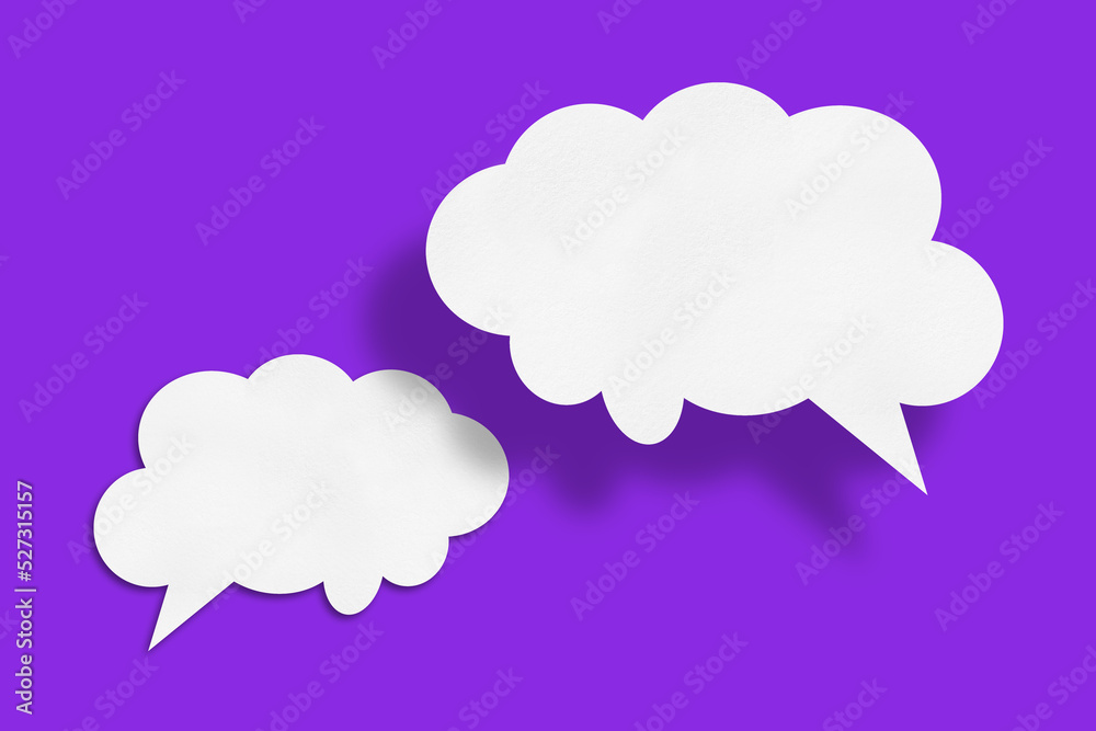white cloud paper speech bubble shape against purple background white cloud paper speech bubble shape against purple background