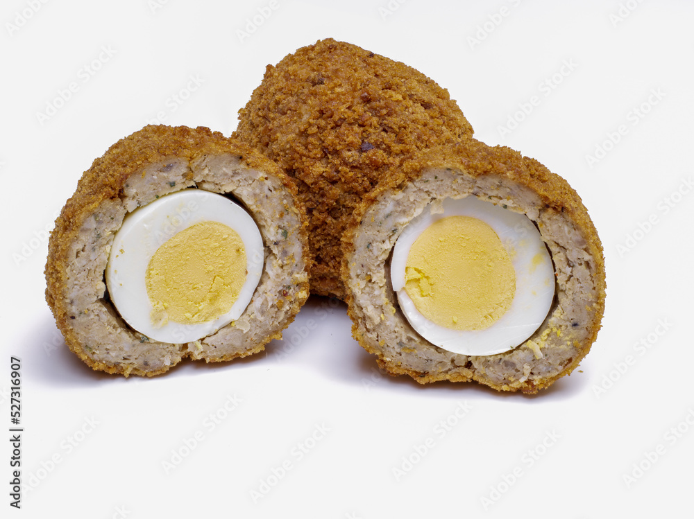 Scotch Eggs  halved isolated on a white background