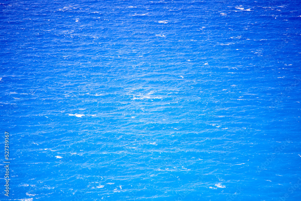Amazing blue sea water color, wind and waves on surface