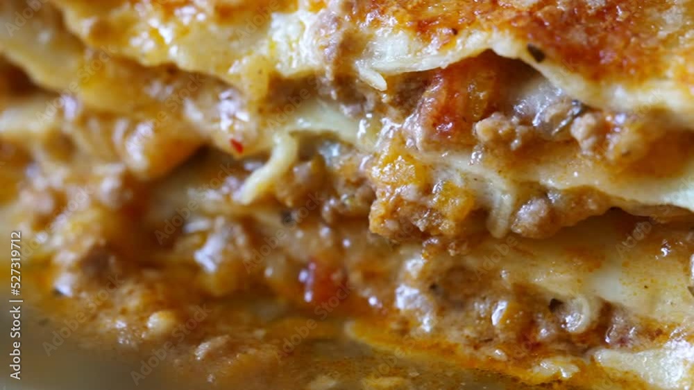 Close-up view of freshly baked Italian lasagna. Close-up view of freshly baked Italian lasagna.