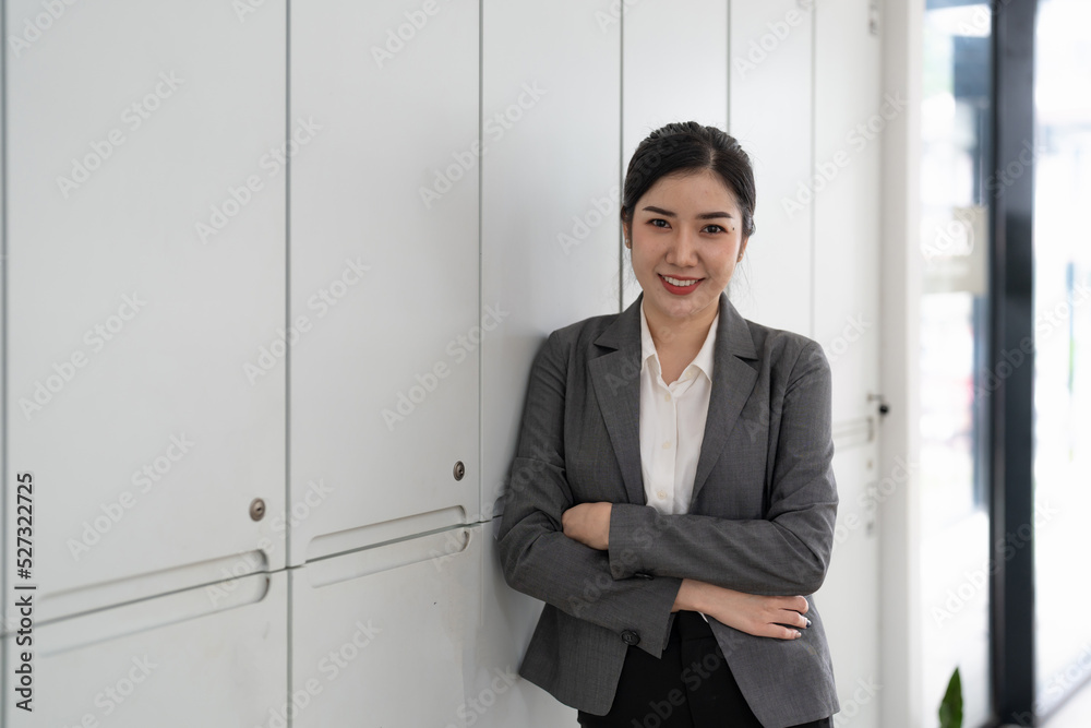 Entrepreneur young asian woman, business woman arms crossed at her office. Entrepreneur young asian woman, business woman arms crossed at her office.