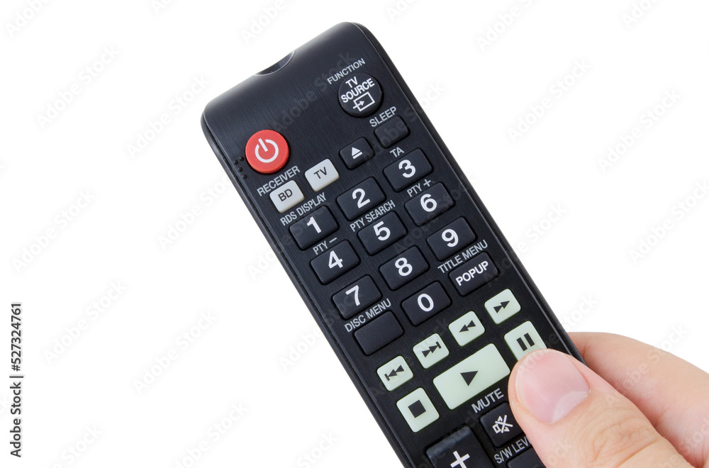 Hand holding remote control, isolated Hand holding remote control, isolated