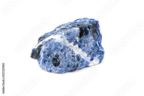 A piece of uncut bluish sodalite with white veins
