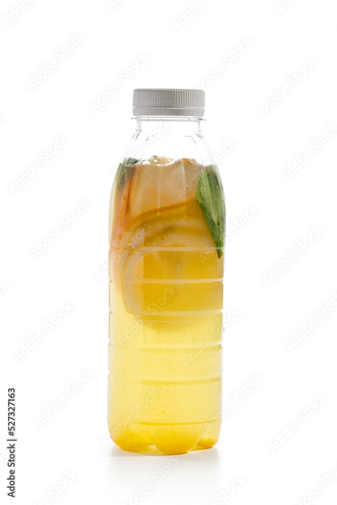 Orange lemonade in plastic bottle isolated on white background. Detox water with orange, mint and ginger. Nonalcoholic cocktail in bottle. Take away drink. Homemade lemonade. Orange lemonade in plastic bottle isolated on white background. Detox water with orange, mint and ginger. Nonalcoholic cocktail in bottle. Take away drink. Homemade lemonade.