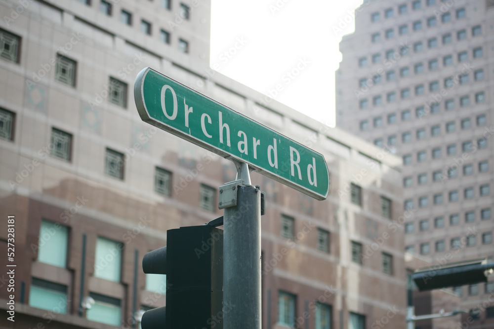 Obraz premium orchad road sing and buildings 