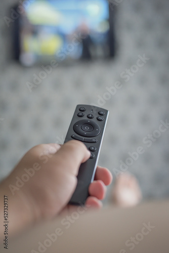 tv remote control in hand