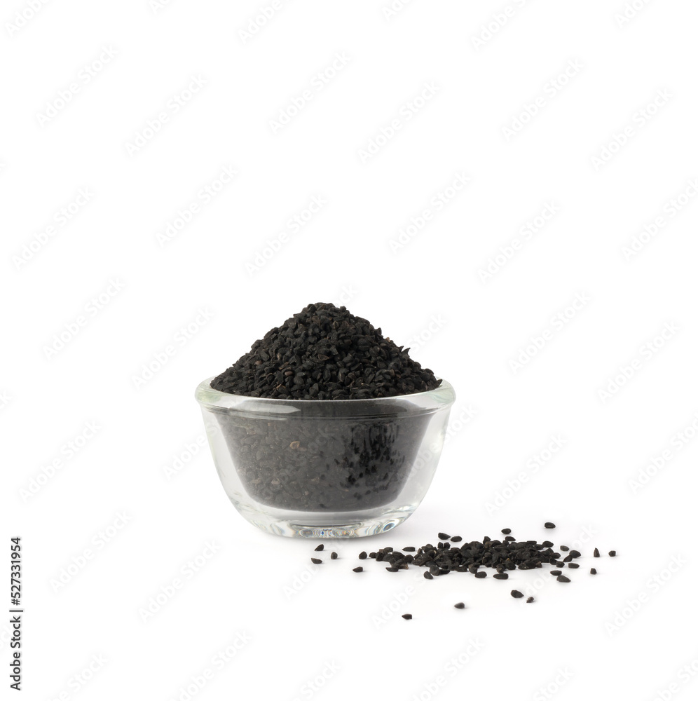 black seeds in a glass bowl, also known as black cumin or caraway or kalonji, with scattered seeds, isolated on white background black seeds in a glass bowl, also known as black cumin or caraway or kalonji, with scattered seeds, isolated on white background