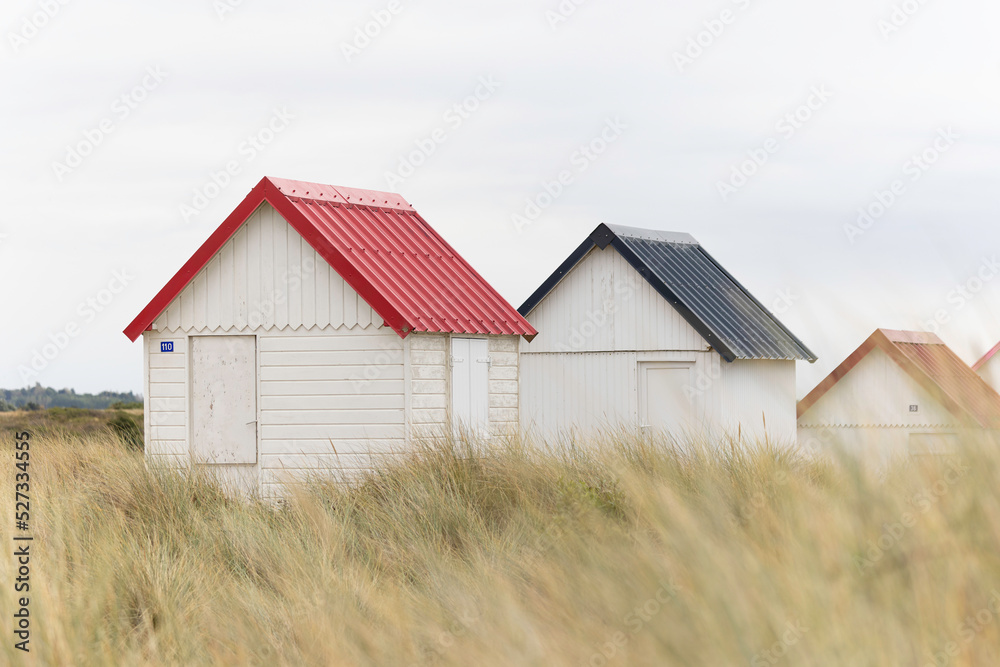 Beach cabins in Gouville sur Mer, Manche, Normandy, France in various lights Beach cabins in Gouville sur Mer, Manche, Normandy, France in various lights
