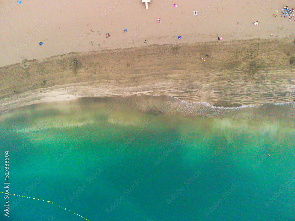 Turquoise water beach as seen from drone