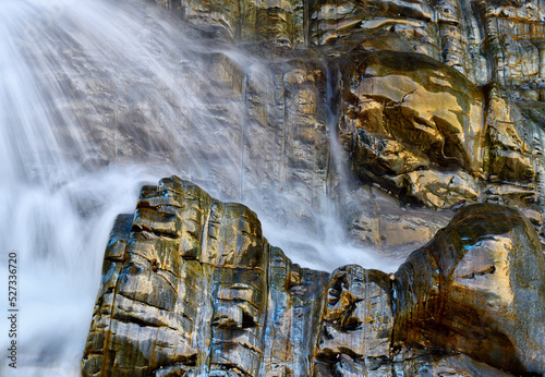 Waterfall on rough wet stones