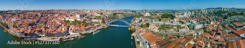 An aerial panoramic view of Porto and the Douro River with bridges 