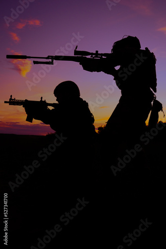 Sniper and his buddy at sunset