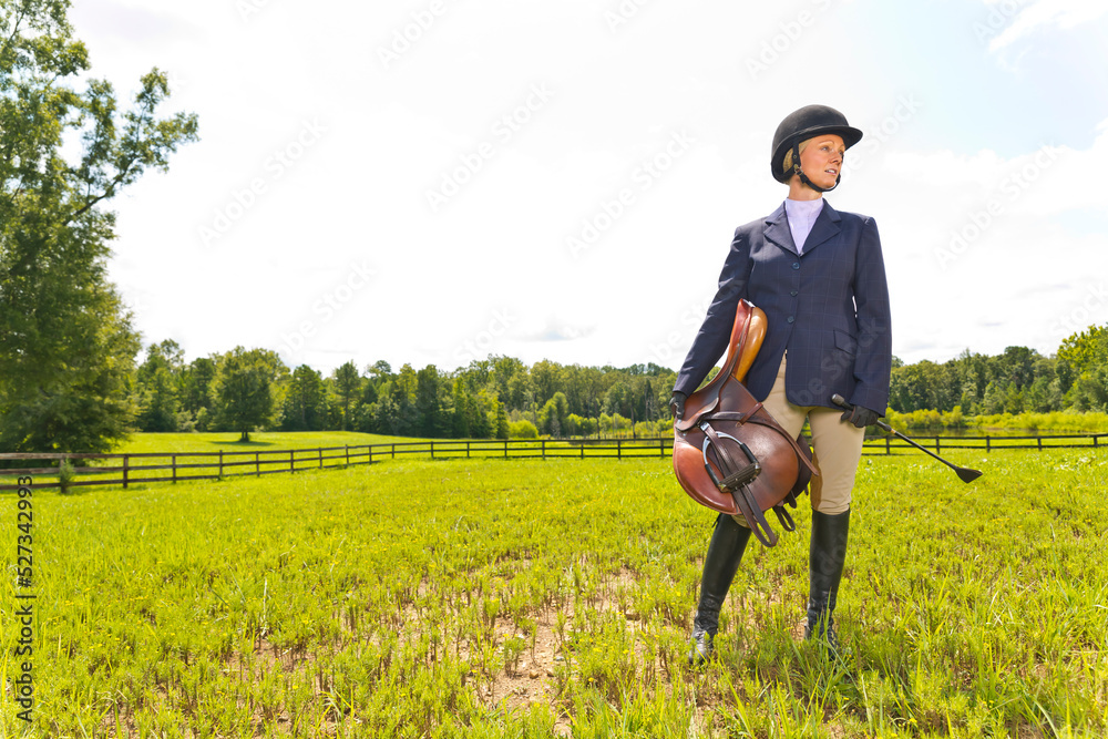 A Skilled Horsewoman Prepares For An Equestrian Event